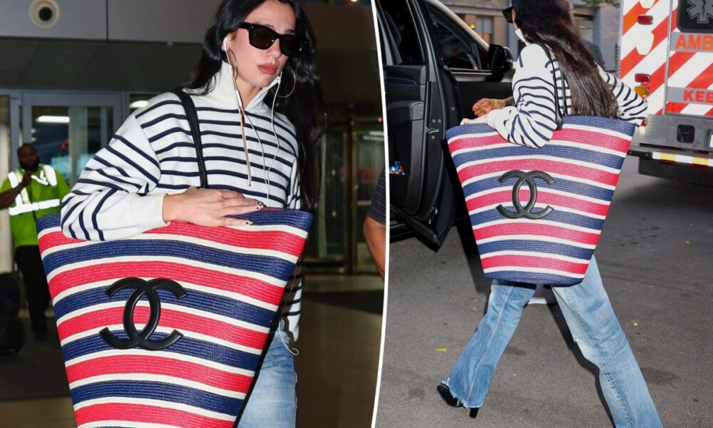 Dua Lipa’s gigantic Chanel bag tests the limits of carry-on luggage