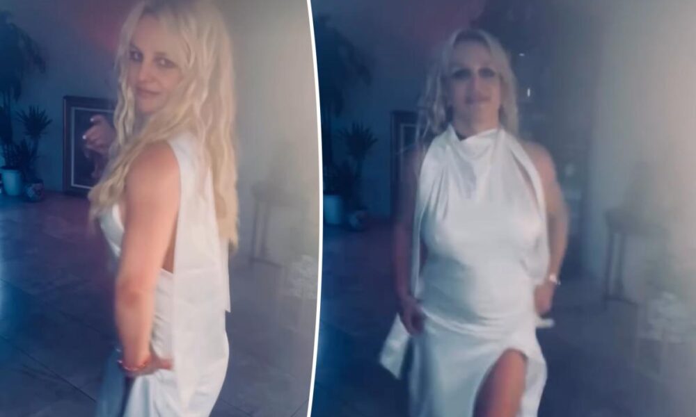 ‘Blessed’ Britney Spears gives dating update as she dances in backless white gown