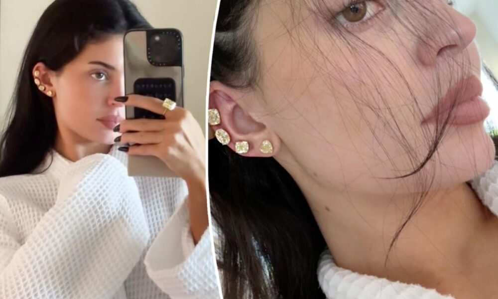 Kylie Jenner wears four massive yellow diamond earrings and matching ring