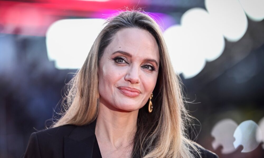 I Usually Travel in Sneakers, But Angelina Jolie’s Comfy, Elevated Airport Shoes Are Changing My Mind