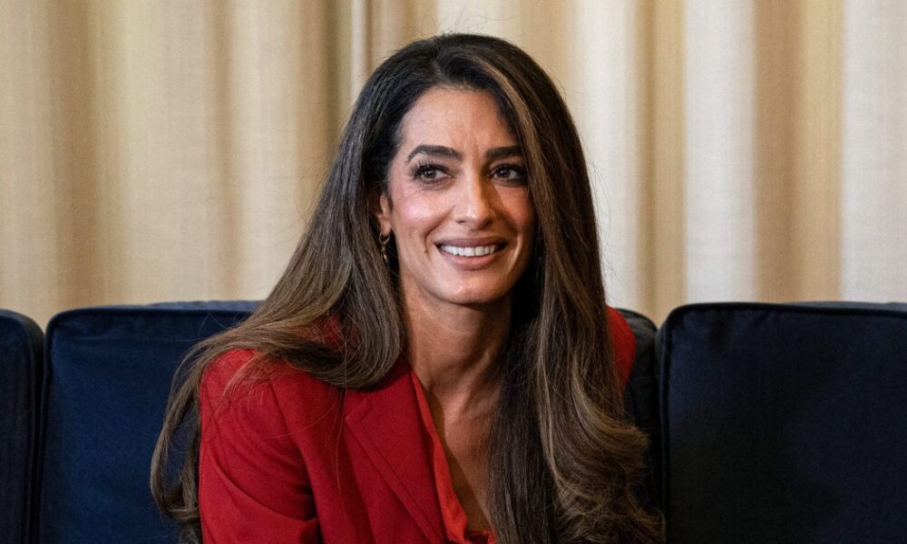 Everyone’s Talking About Amal Clooney’s Rich-Girl Blouse Style — We Found It for Only $19