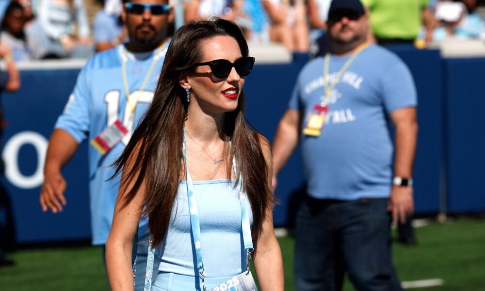 Bill Belichick’s Girlfriend Jordon Hudson Trades Snakeskin for a Jumpsuit While Cheering on UNC