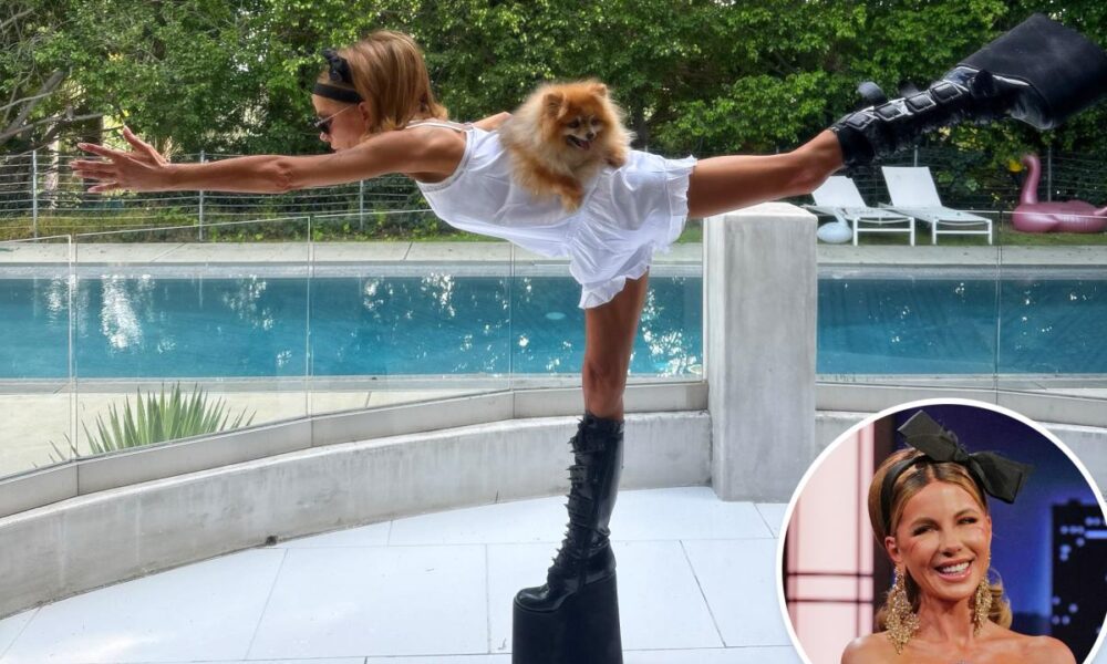 Kate Beckinsale defends ‘ridiculous’ yoga session in platform boots with dog on her back