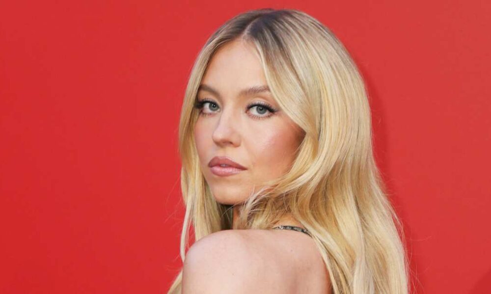 Sydney Sweeney Poses Naked for Edgy New Ad Campaign, Covers Her Breasts With Footballs