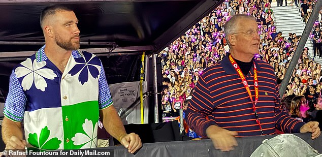 Wow: Scott, 71, stood right next to his daughter's boyfriend - and was even wearing a lanyard from Travis' NFL team, the Kansas City Chiefs