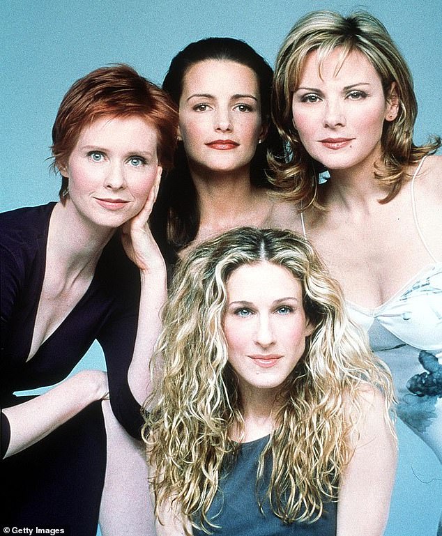End of an era: The reviewer for the The Guardian didn't mince their words when they branded the first 20 minutes of the reboot 'terrible' due to Samantha Jones's (played by Kim Cattrall) absence, jarring dialogue and a rushed catch up of events (the cast pictured in 2001)