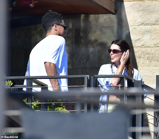 'What first seemed like a fun hookup, is now a relationship. They are exclusive and Kendall is very happy with Devin,' a People insider gushed that month