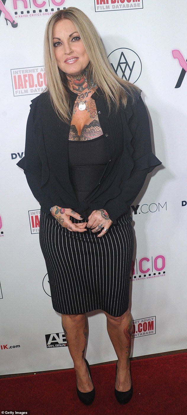 Mother-of-two Lindemulder has faced a tumultuous time, having been jailed in 2008 and then becoming embroiled in a bitter custody dispute over her daughter with her ex-husband Jesse James. Here she is pictured in April 2017... but can you work out which album she was on?