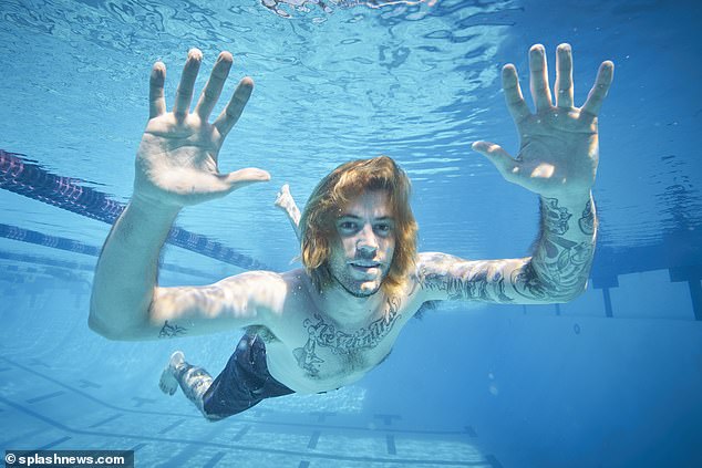 He went on to recreate the iconic snap years later on the 25th anniversary of its release in 2016 - before then trying to sue Nirvana claiming he had been sexually exploited. His case was thrown out by a judge