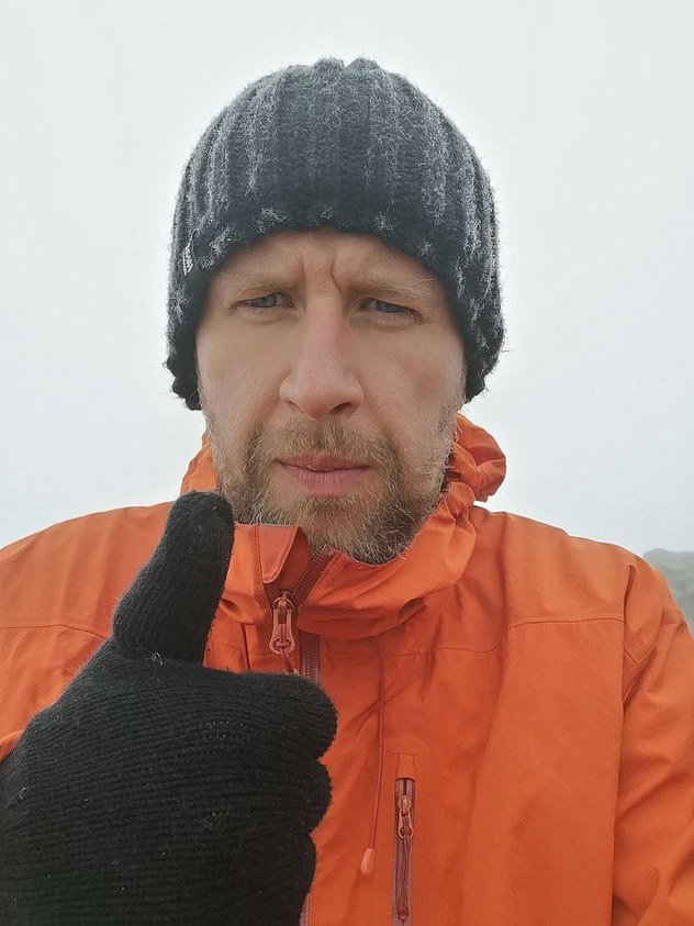 Thumbs up:  Chris was told to go out and get drunk before returning for his 2am photoshoot in Liverpool for the iconic cover of this group's album. Here's Chris pictured in October 2020