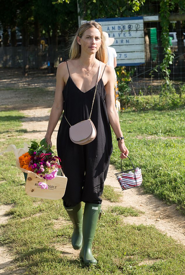 Leilani's new life sees her running Botanica Bazaar specialising in beauty products. She is pictured in September 2017 attending the goop X Cadillac Road To Table Dinner In The Hamptons