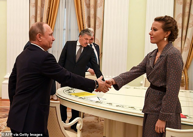 Sobchak ultimately lost out to Putin in 2018's presidential election race that was rigged in the Russian leader's favour. She came fourth. Sobchak is pictured shaking Putin's hand in March 2018