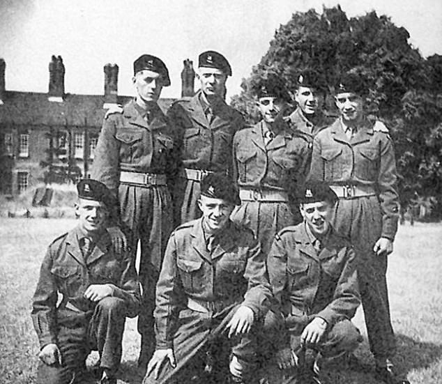 Sir Michael (second from the left, back row) was just 19 when he was called up to do his National Service in 1952