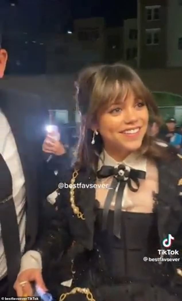 Actress Jenna Ortega, 20, is seen at the MET Gala on May 1 holding her phone that shows a photo of Emma Myers, 21