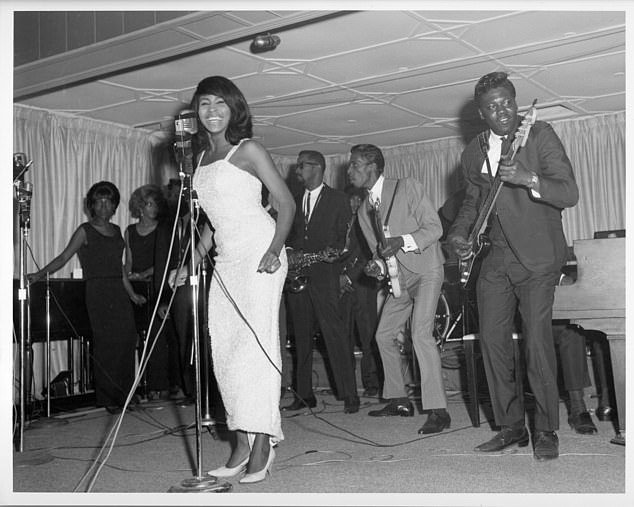 By then Ike, a local celebrity and inveterate womaniser, had become her mentor. He bought her pretty clothes and taught her how to sing even better on stage. pictured as husband and wife on stage in 1964