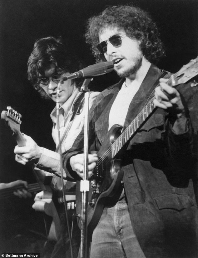 A five-time Grammy nominee who was inducted into the Rock & Roll Hall of Fame, Robbie is seen here shredding with Dylan back in 1972, before he went on to become one of the founding members of The Band