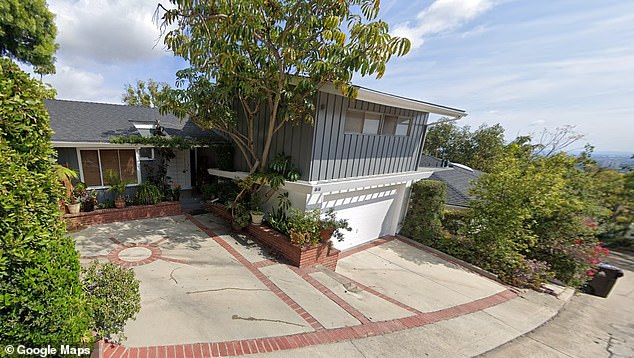 The suit centers around the pair's purchase of this Beverly Hills home, which they said was Zuccarini's handiwork. The home was bought less than two years before Zuccarini wed Robertson in March 2023, a ceremony held months before his death this past August