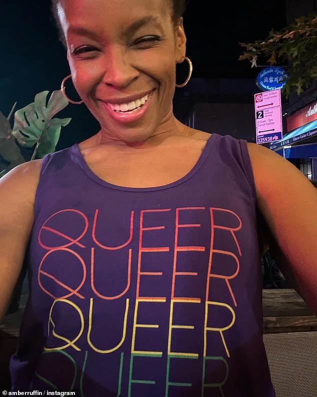 Amber Ruffin posted a picture of herself in a tank top baring the word 'Queer' in rainbow colors