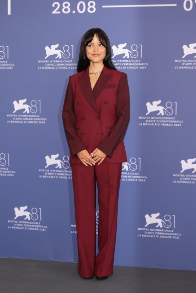 Jenna Ortega wears Paul Smith at the "Beetlejuice Beetlejuice" photocall during the Venice Film Festival 2024.