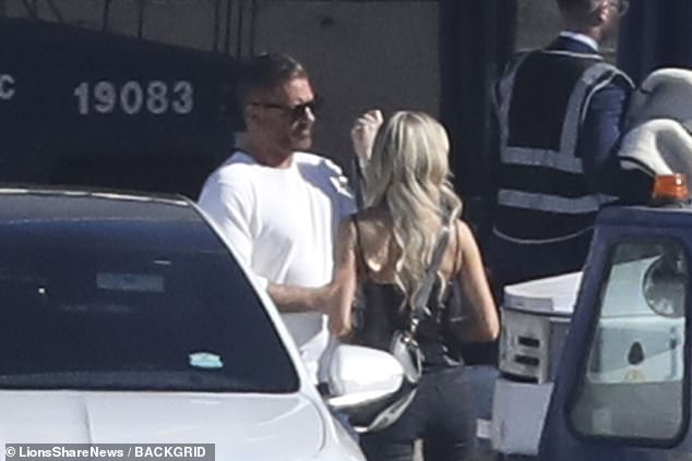 Chris and Christina made their first public appearance together at Los Angeles International Airport on Tuesday as seen in photos exclusively obtained by DailyMail.com