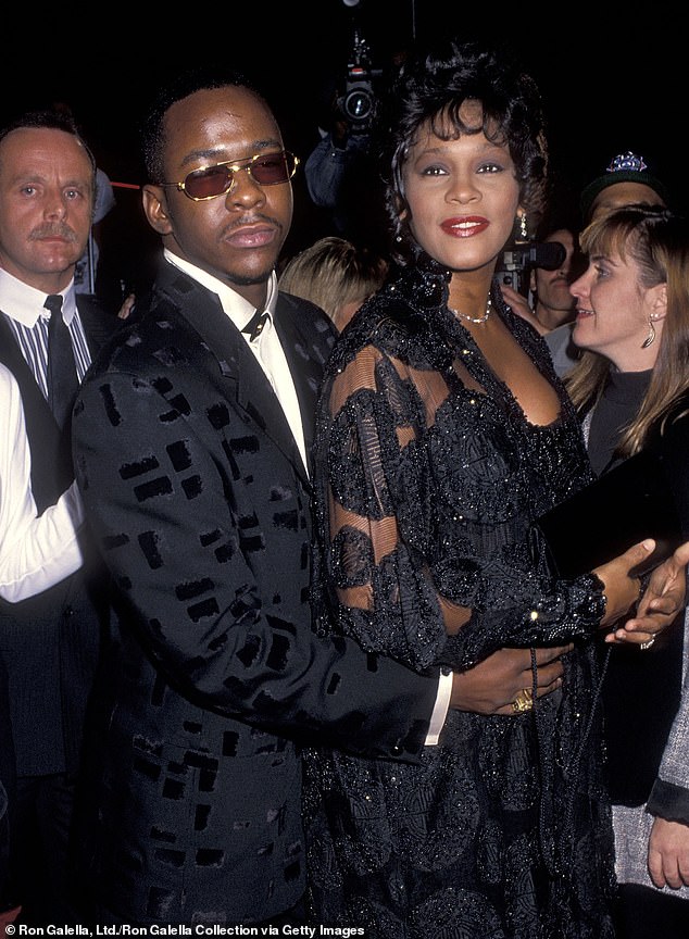 Roberts (left) watches over Bobby Brown and Whitney Houston at The Bodyguard premiere in 1992